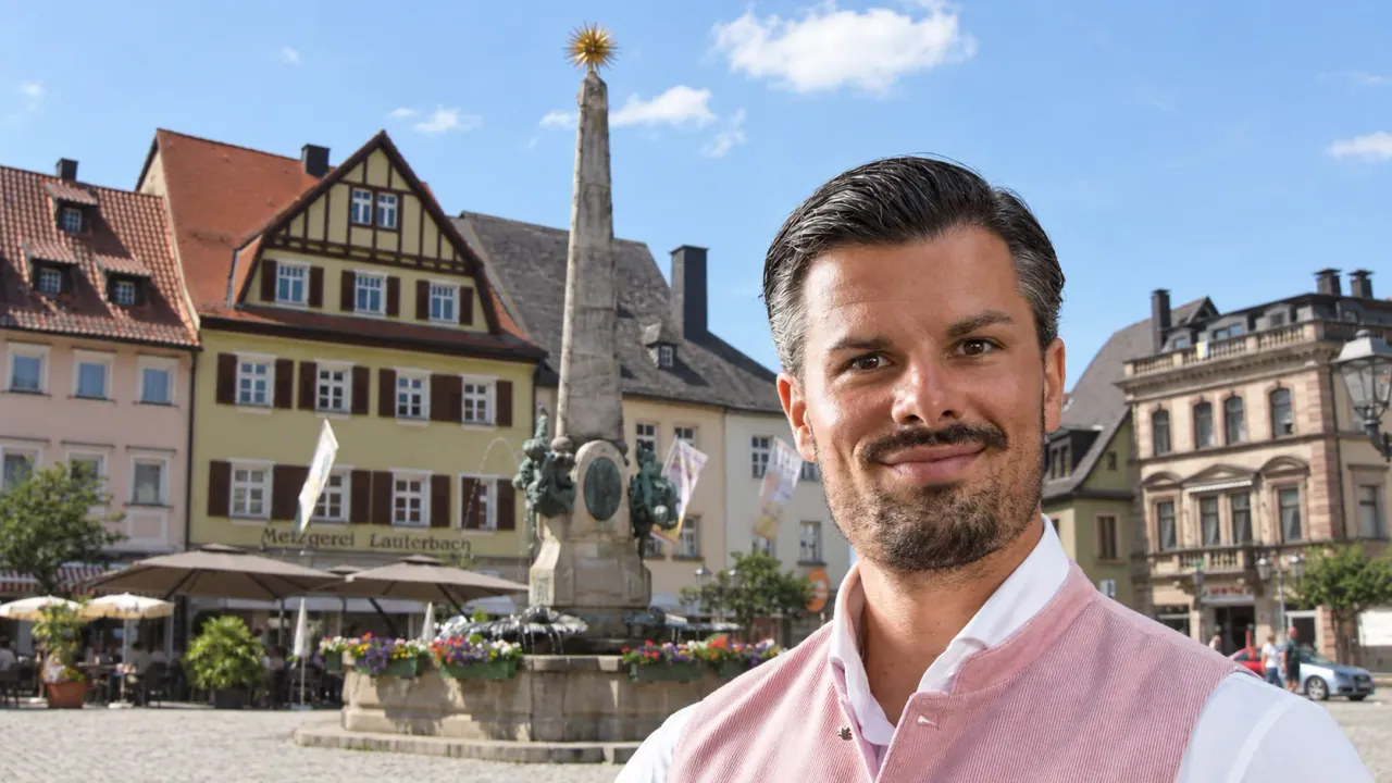 Fotomontage: Alexander Streng in Tracht am Marktplatz von Kulmbach